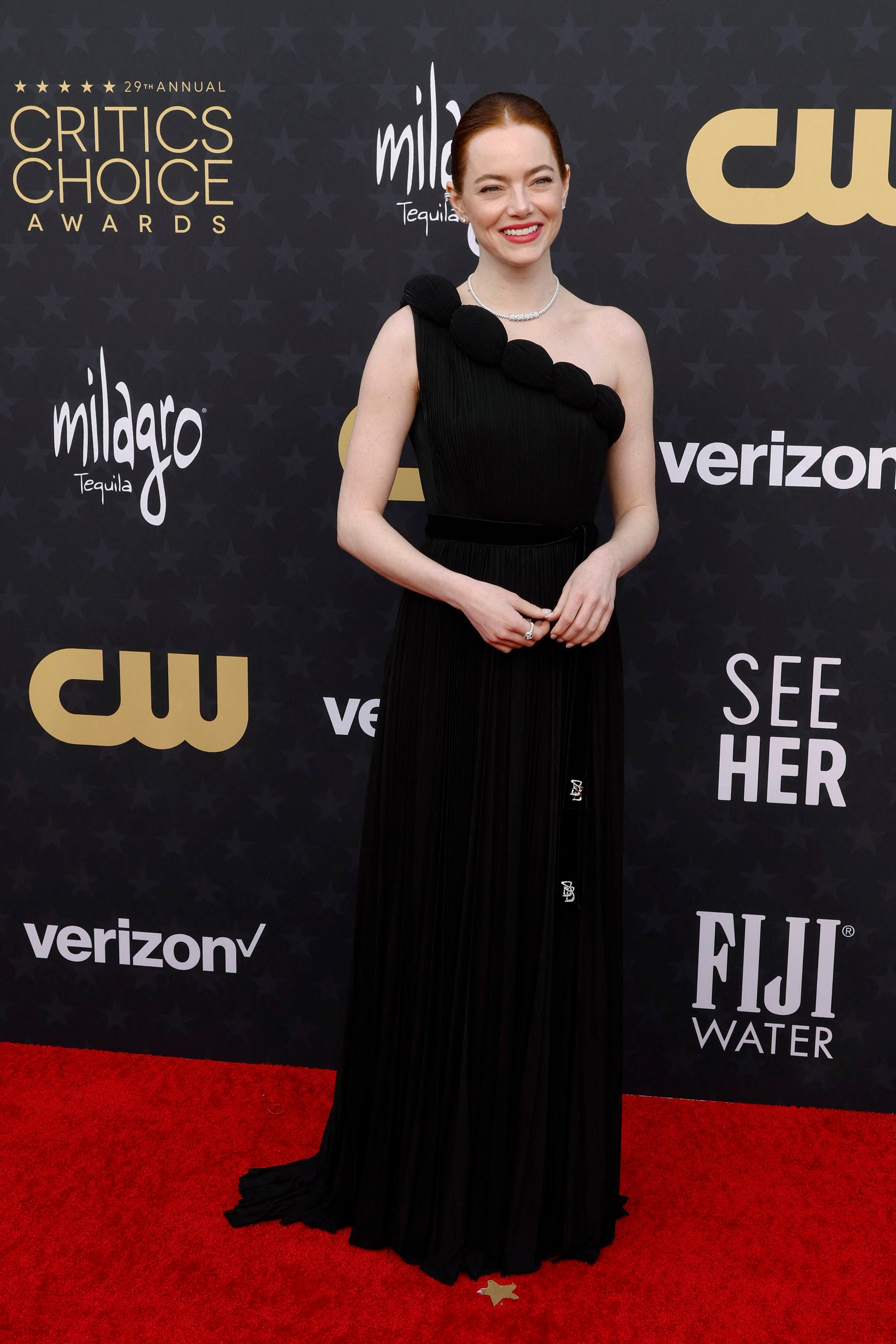 SANTA MONICA, CALIFORNIA - JANUARY 14: Emma Stone attends the 29th Annual Critics Choice Awards at Barker Hangar on January 14, 2024 in Santa Monica, California.   Frazer Harrison/Getty Images/AFP (Photo by Frazer Harrison / GETTY IMAGES NORTH AMERICA / Getty Images via AFP)