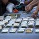 $ 30.000, armas, droga y 14 detenidos en allanamientos en Durán